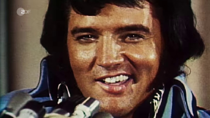 Neben Elvis, sind auch kurz John Lennon, Mohamed Ali und Paul Newman zu sehen